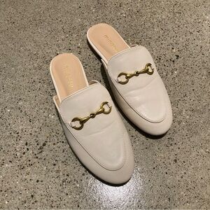 Minimalist White Loafers with Gold Detail